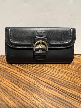 Coach SoHo Black Leather Wallet with Gold Buckle Accent